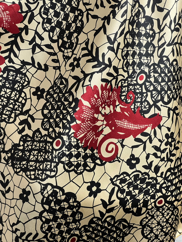 
                  
                    The Honeycomb Floral Silk Rag
                  
                