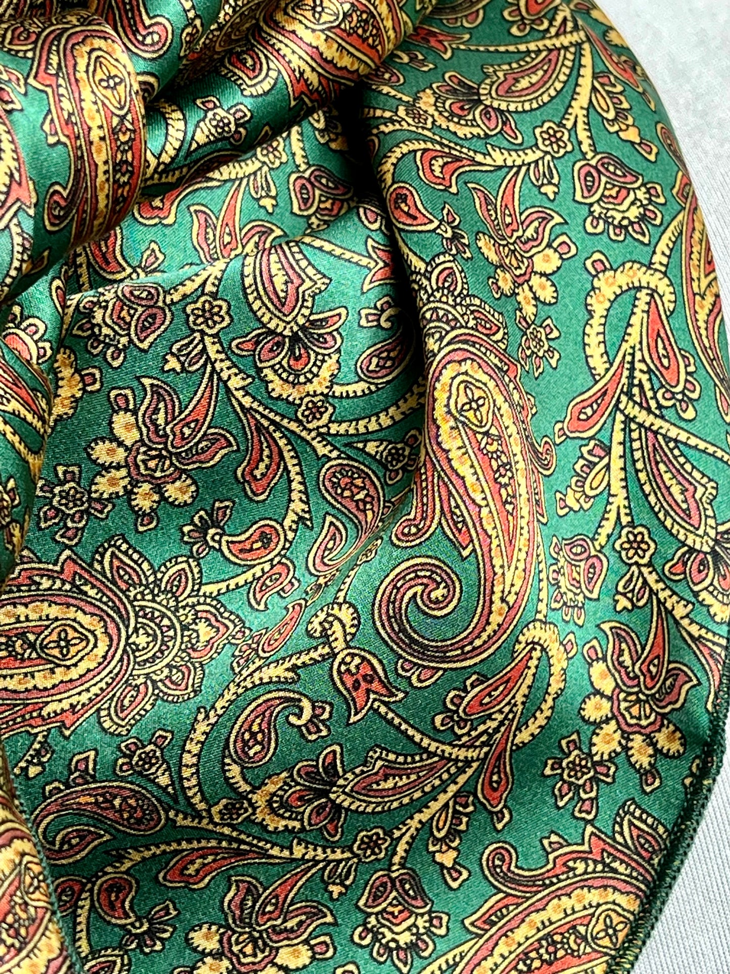 
                  
                    The Verde Paisley Silk Rag
                  
                
