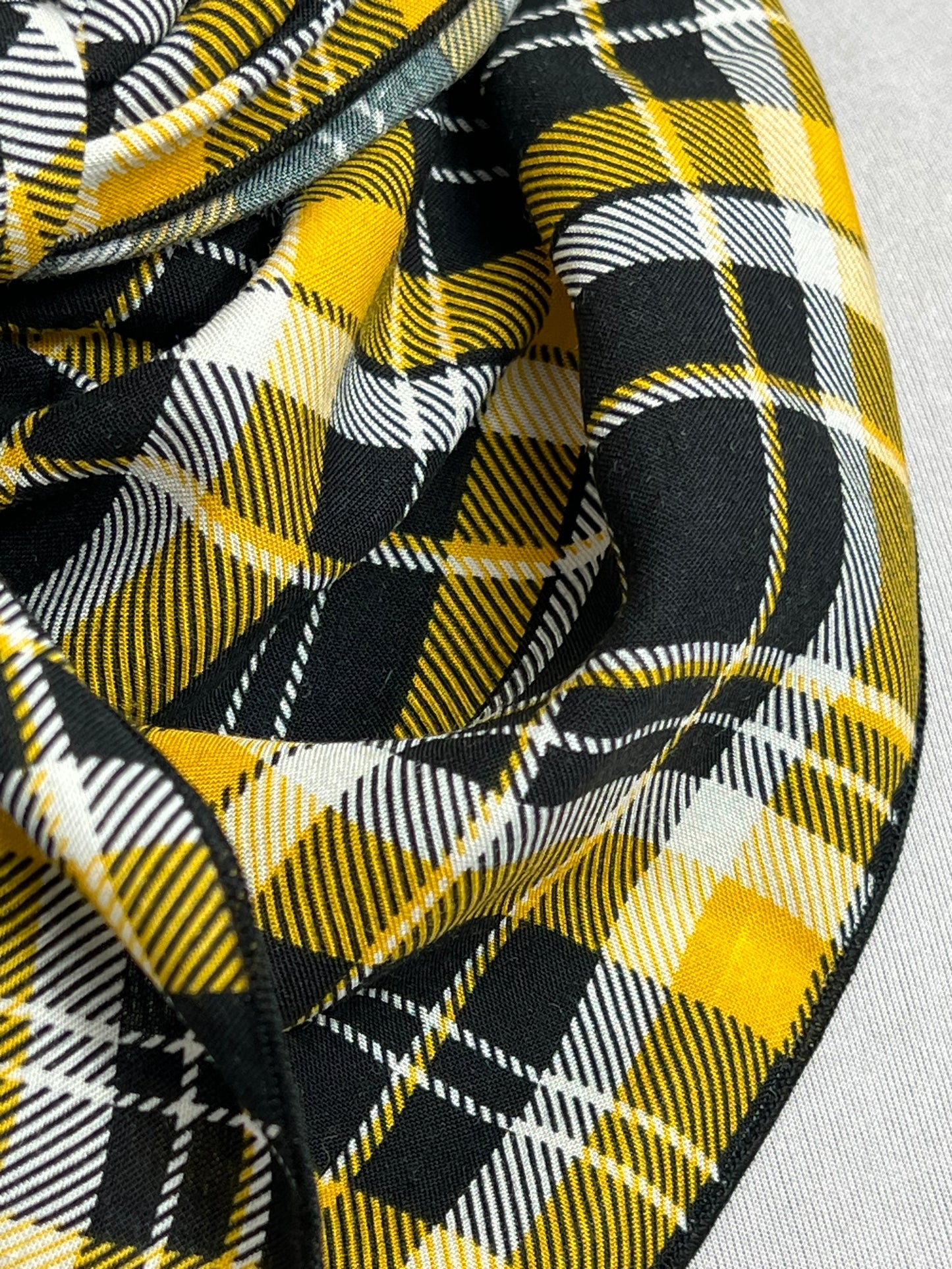 
                  
                    The Black & Yellow Plaid Silk Blend Rag
                  
                